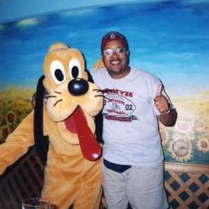 Me and Pluto at the Garden Grill Resturant Epcot