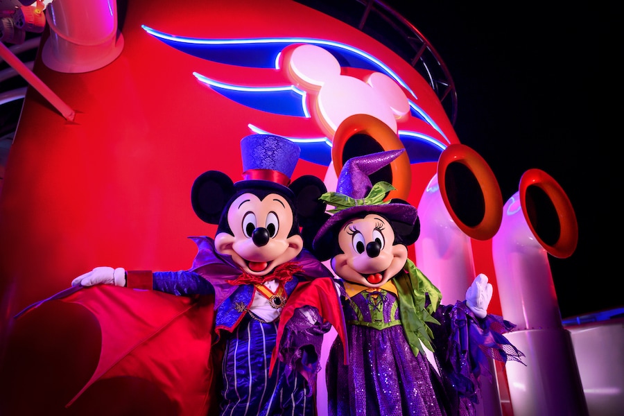 Mickey and Minnie Mouse in Halloween costumes