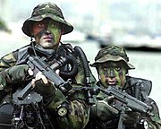 180px-US_Navy_SEALs_in_from_water.jpg