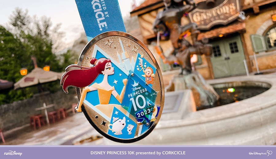Belle on medal for Disney Princess 10K