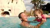 pool-hopping-father-daughter-plays-in-water-16x9.jpg